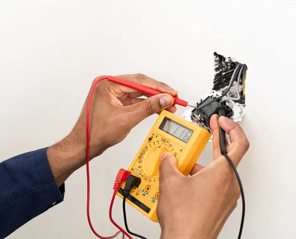 Electrical work being performed on an outlet in a Belleville IL home
